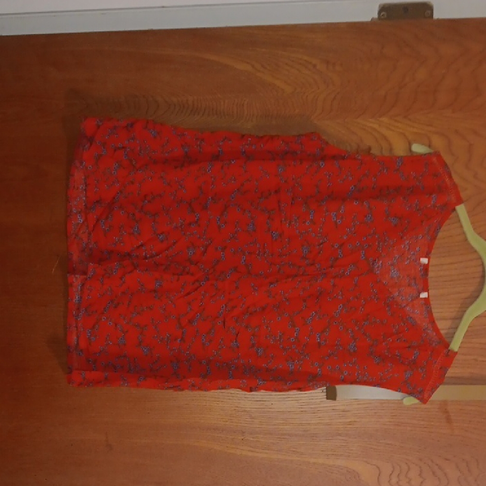 Red Sleeveless Top with Floral Pattern